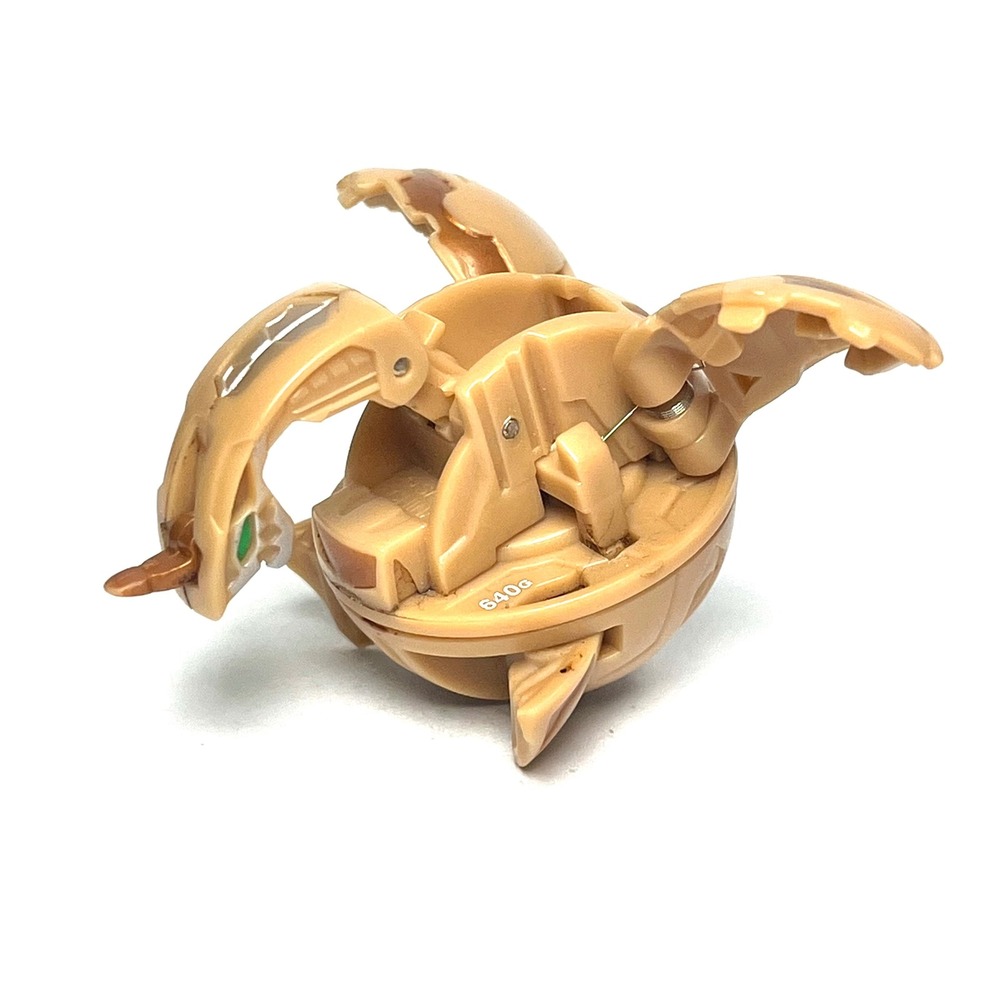 Bakugan Subterra Spin Dragonoid 640G Tan Bronze Earth Battle Brawler
0073 Toy